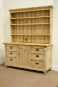 19th century pine dresser fitted with central cupboard and series of three drawers either side,