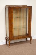 Early 20th century walnut display cabinet enclosed by single glazed door, W74cm, H114cm,