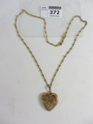 Gold locket and fancy link necklace stamped 750 approx 22gm