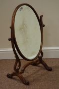 Edwardian mahogany oval dressing table mirror, fitted with bevelled glass, W50cm,