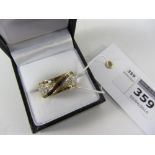 Black baguette and white diamond cross-over gold ring hallmarked 9ct