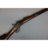 19th century Remington type single shot breech loading centre fire Rolling Block Round carbine,