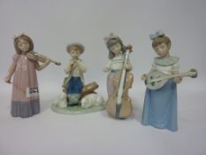 Four Nao figures - children playing instruments