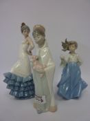 Lladro figure of a child with a toy and two Nao figures (3)