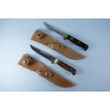 Two similar Bowie knives with12cm blades,