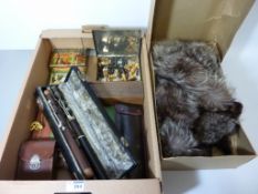 Fox fur stole, woodwind instruments, vintage camera,