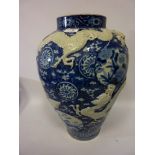 Late 19th/early 20th century Japanese blue and white floor vase with applied dragon decoration