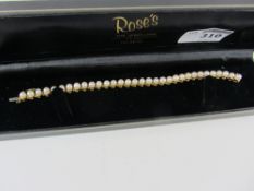 Pearl link gold bracelet hallmarked 15ct