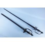 Two similar Georgian swords, 81cm and 61cm blades, brass hilts with double shell guards,