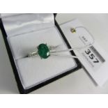 Oval emerald and channel set diamond white gold ring hallmarked 18ct