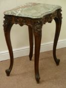 French style walnut table fitted with cabriole legs heavily carved with foliage,