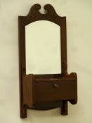 Edwardian walnut hall mirror with hinged compartment