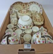 Early 19th century Derby tea and coffee service painted with flower heads in one box