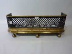 Victorian brass and fretwork steel fender 70cm overall