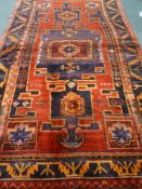 Persian Hamadan red and blue ground rug,