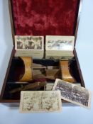 Two 19th century stereoscope card viewers with together with 100 cards - locations include New York,