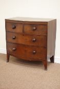 Early 19th century mahogany bow front chest of two short and two long drawers on swept bracket feet,