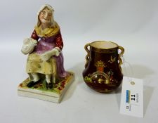 19th century Staffordshire figure 'The Cobbler's Wife' and a Carlton Ware 'Rouge Royale' squat vase