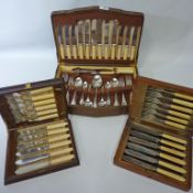 Canteen of stainless steel cutlery - six place settings in oak case,