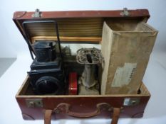 Vintage suitcase and contents - railway lamp, two railway photographs and a colour print,