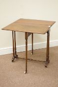 Victorian walnut small Sutherland table, the rounded rectangular top with moulded edge,