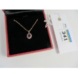 Ruby and diamond pendant necklace hallmarked 9ct