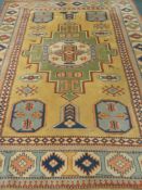 Turkish beige, blue and red ground rug,