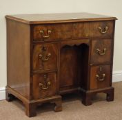 George II mahogany kneehole writing desk/dressing table the rectangular figured top with quarter