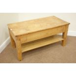 Rustic pine rectangular coffee table with storage compartment enclosed by swivel top,
