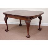 Early 20th century mahogany extending dining table with ball and claw feet, two leaves,