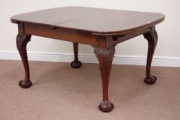 Early 20th century mahogany extending dining table with ball and claw feet, two leaves,