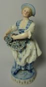 Late 18th/early 19th century Meissen figure of a flower seller, incised numbers to base C.73.72