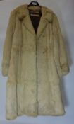 3/4 length blonde coney fur jacket bearing label 'Maxwell Cowan (York) Ltd Tailors and Furriers'