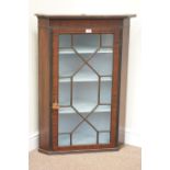 Early 19th century inlaid mahogany corner display cabinet, enclosed by single astragal glazed door,
