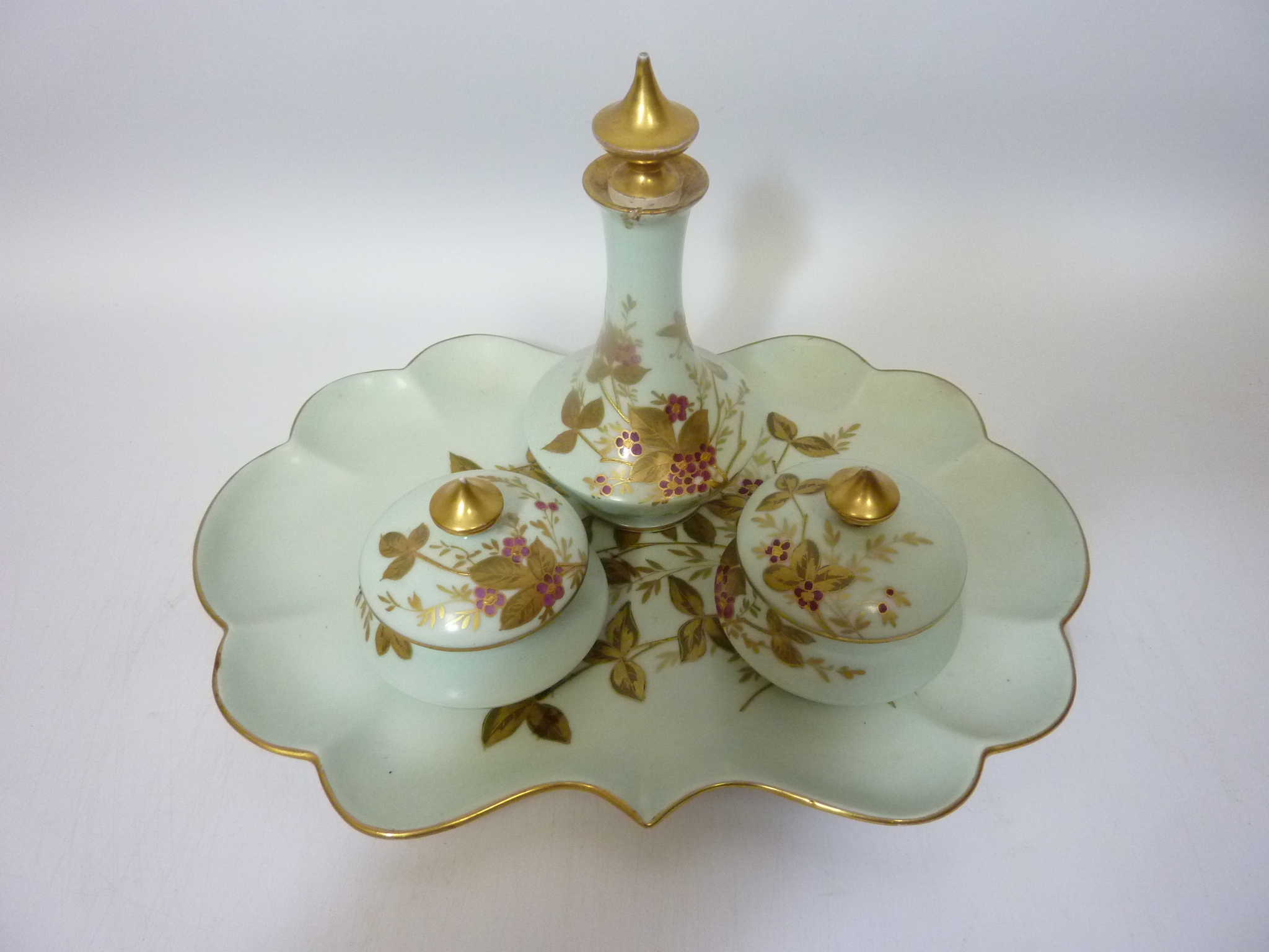 Early 20th century Limoges three piece dressing table set with floral decoration