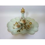 Early 20th century Limoges three piece dressing table set with floral decoration