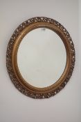 Circular gilt framed wall mirror,