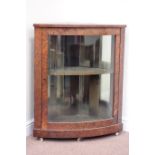 Early 20th century oak corner display cabinet enclosed by single glazed door, W67cm,