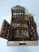 Collection of souvenir spoons and racks,