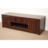 Hardwood Chinese style television stand fitted with cupboards either side,