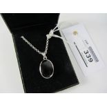 Double sided oval Whitby jet pendant on chain stamped 925