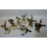 Six Capodimonte bird studies and a Franklin Porcelain sculpture 'European Goldfinch' (7)