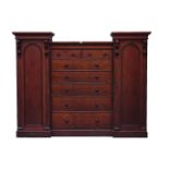 Victorian mahogany wardrobe, central chest fitted with two short and five long graduating drawers,