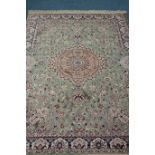 Persian Keshan design green ground rug,