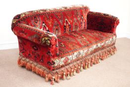 Victorian two seat sofa upholstered in Turkish red pattern cover,