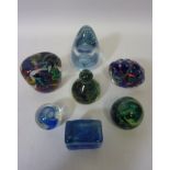 Seven 20th century glass paperweights