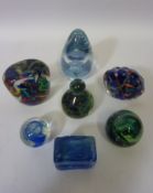 Seven 20th century glass paperweights