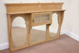 Edwardian polished pine overmantle mirror,