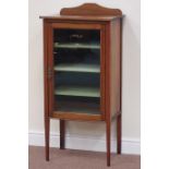 Edwardian inlaid mahogany music/display cabinet enclosed by single glazed door,