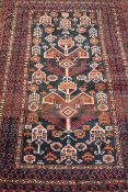 Afghan Baluch red ground hand knotted rug,